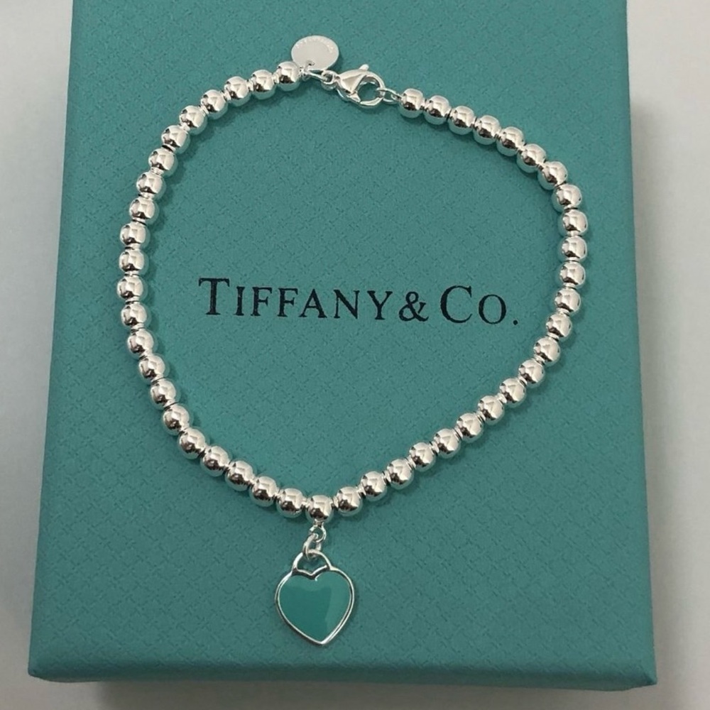 Blue Tiffany and Co. heart tag beaded bracelet